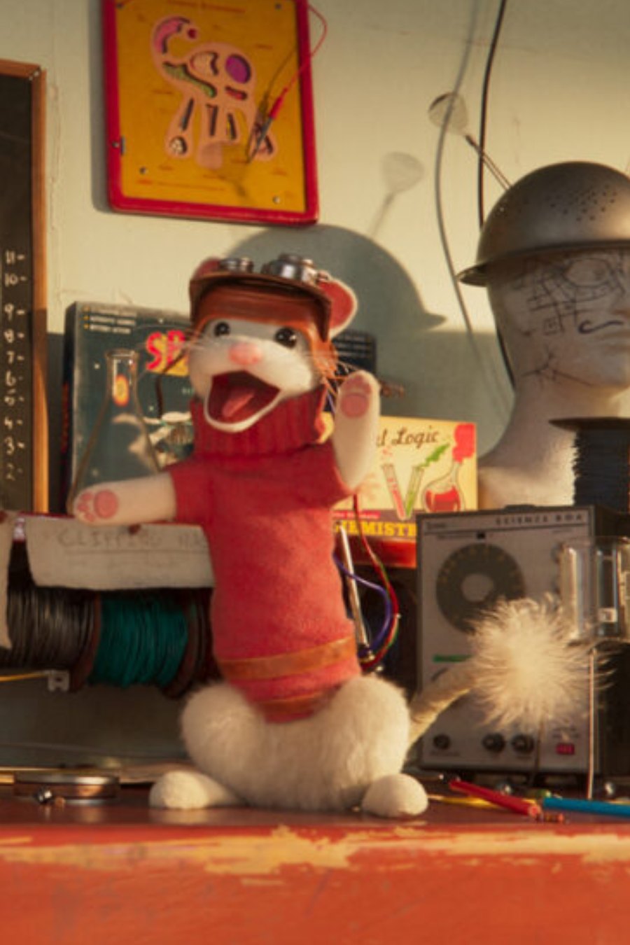 ALab & Unhinged still: Goggles the mouse in a cluttered workshop